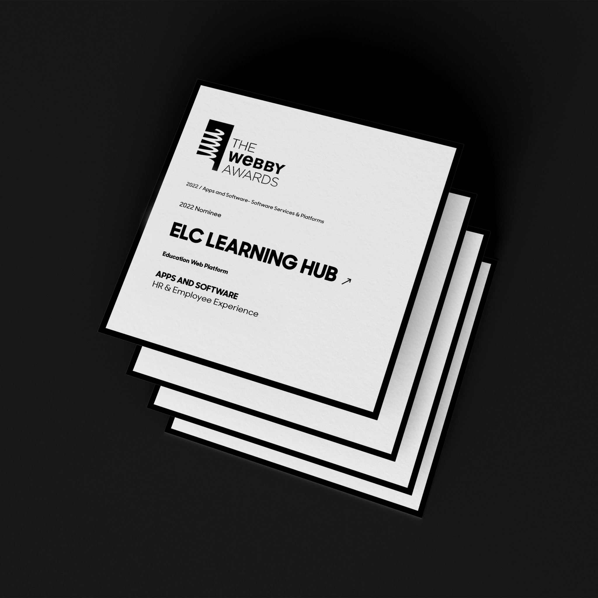 Stack of Webby Awards nominee cards for ELC Learning Hub on a black background