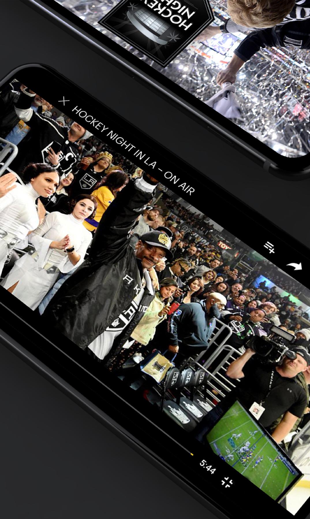 Phones displaying Hockey Night in LA video clips from a crowded arena