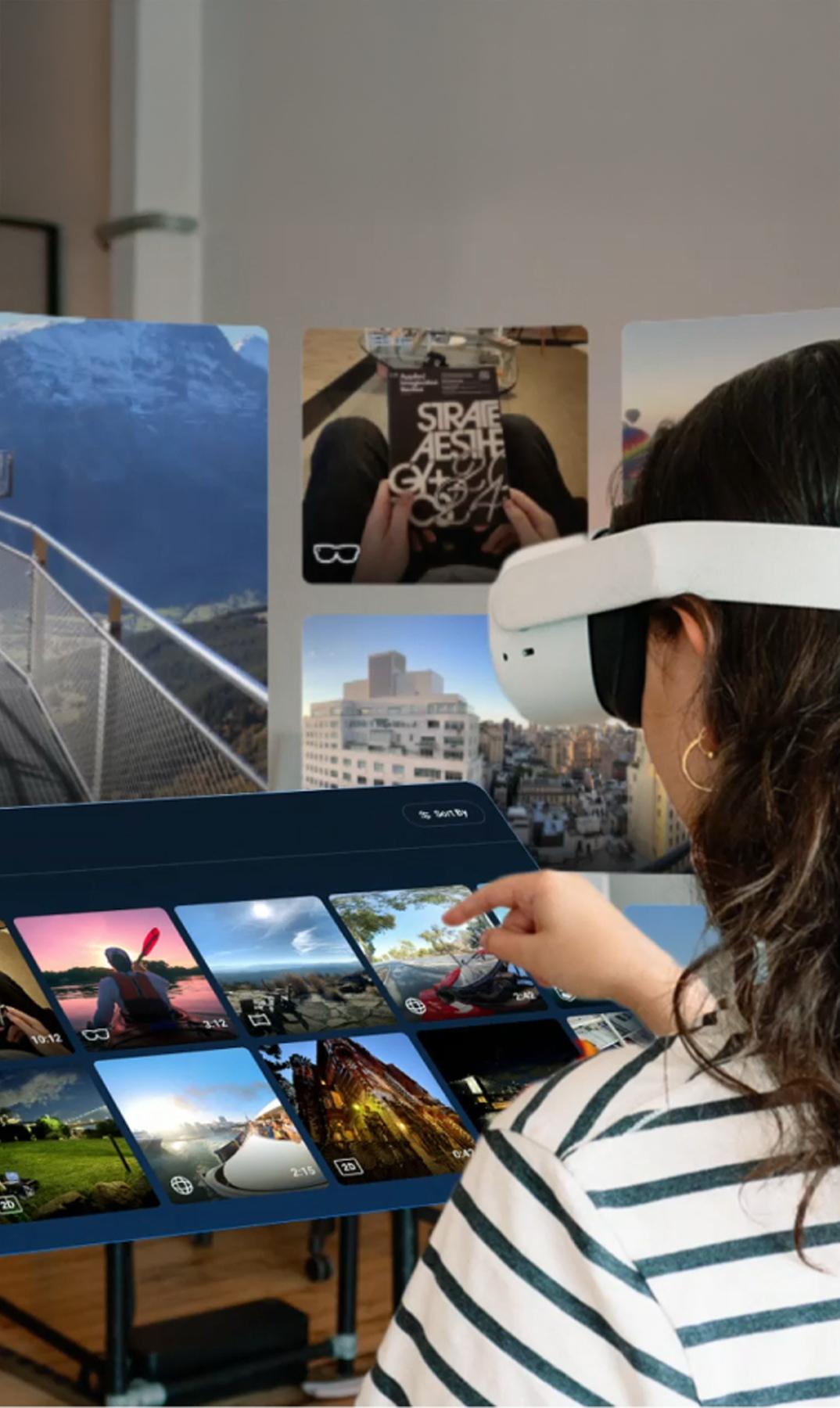 Person wearing a VR headset pointing at a floating media gallery interface