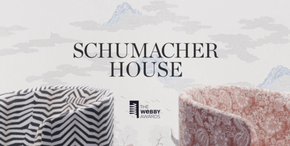 Schumacher House title over wallpaper with two patterned chairs and The Webby Awards logo