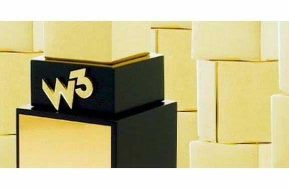 Black cube with gold W3 logo surrounded by glowing yellow blocks