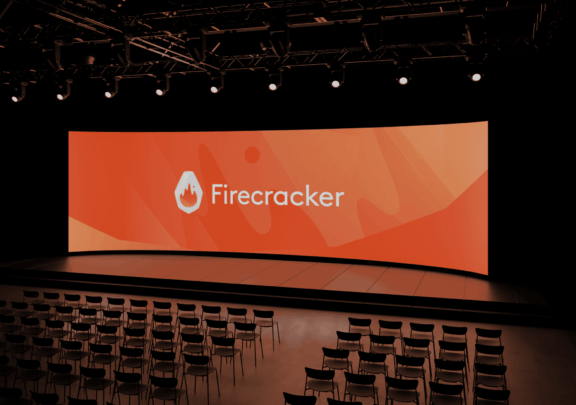 Firecracker logo displayed on a large stage screen