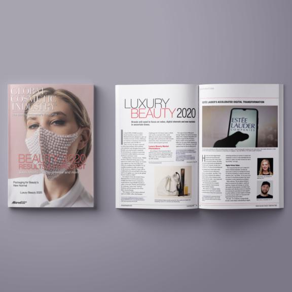 Beauty 2020 report cover and open luxury beauty magazine spread on gray background