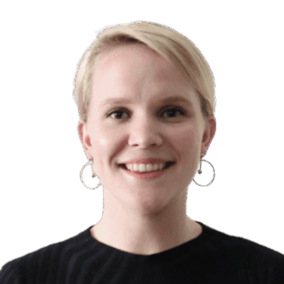 Smiling blonde woman with hoop earrings and a black top on a green background