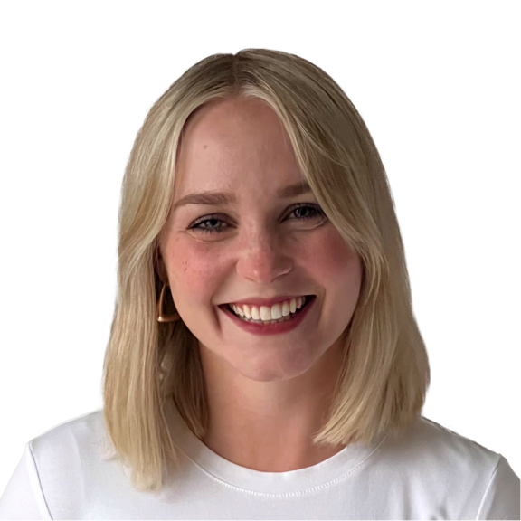 Headshot of a smiling blonde woman wearing a white shirt