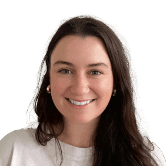 Smiling young woman with long dark hair in a white top on a green background