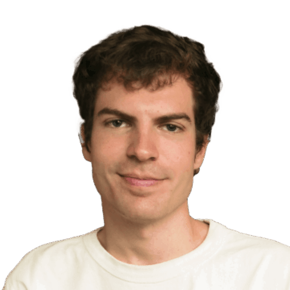 Head-and-shoulders portrait of a young man in a white shirt on a green background