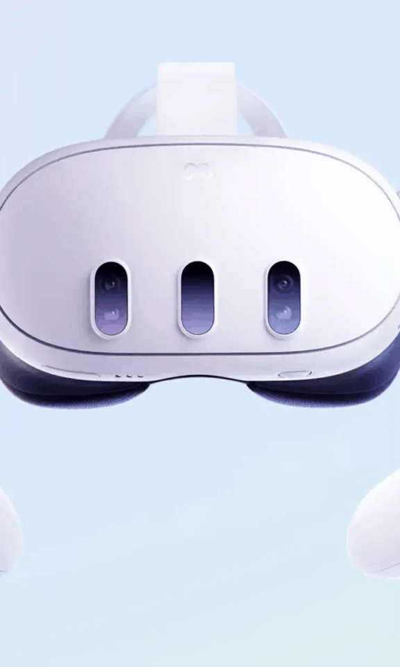 Meta Quest 3 headset and two controllers on a pale gradient background
