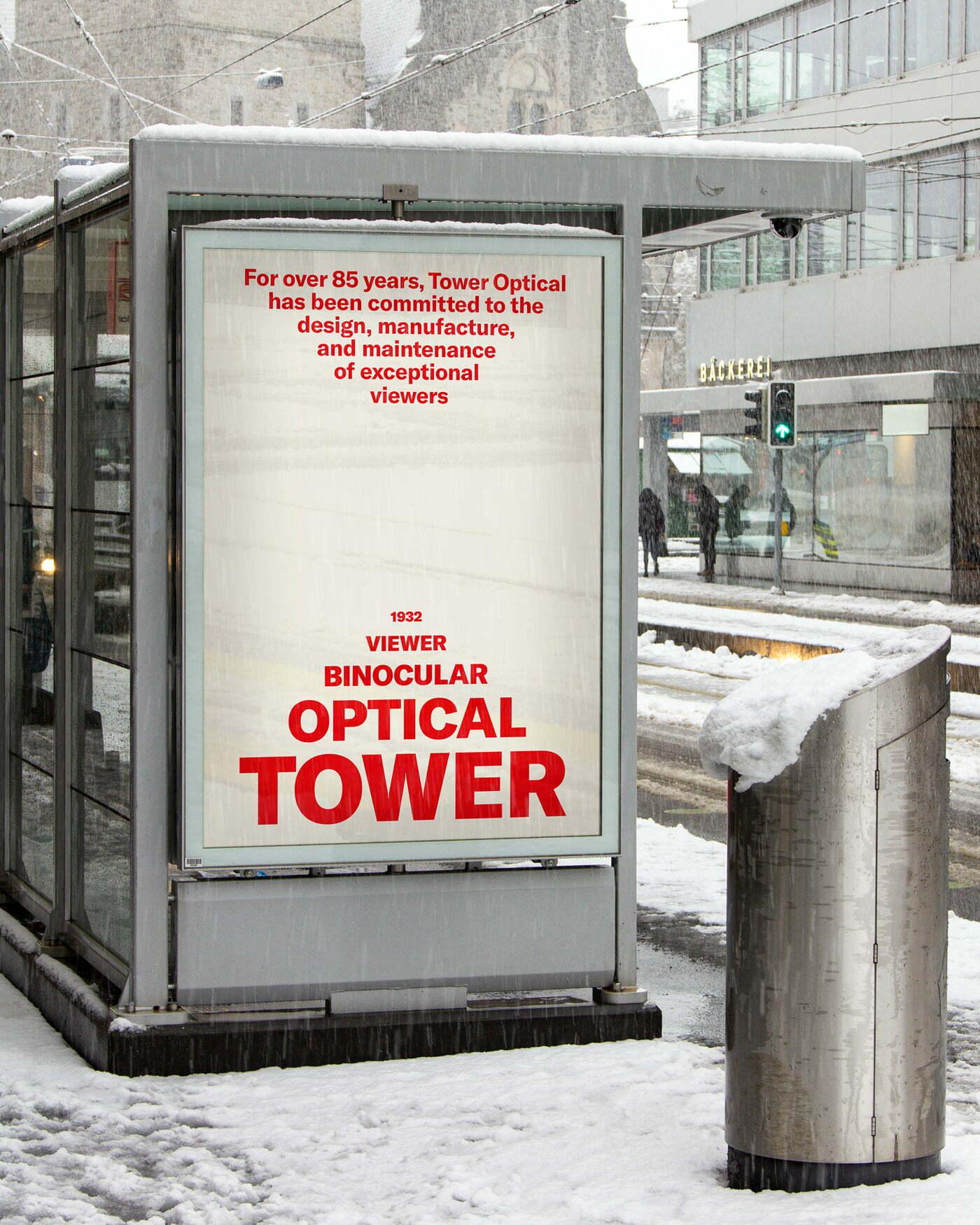 Outdoor advertising kiosk for Tower Optical in a snowy plaza