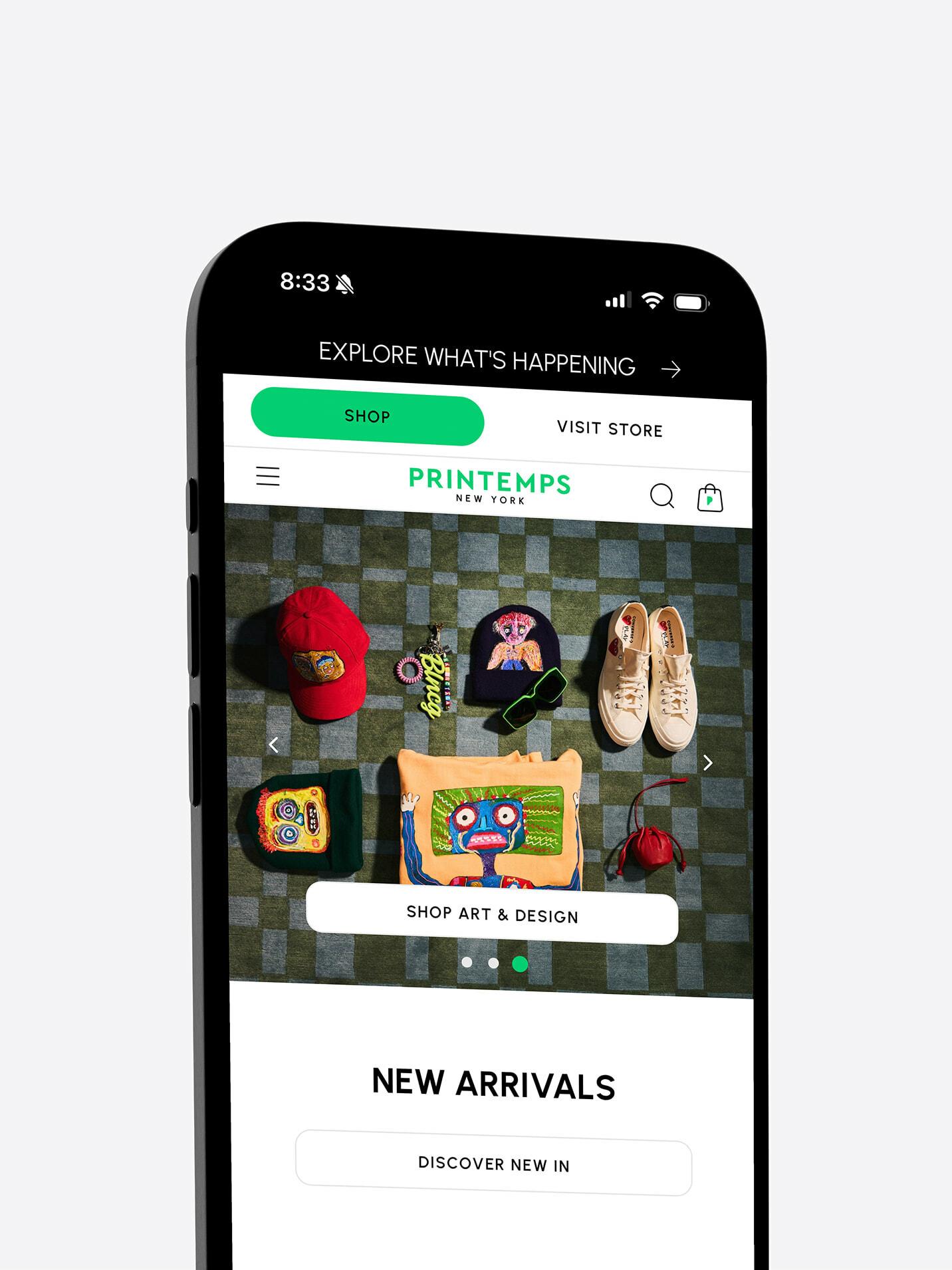 Phone showing Printemps New York shopping page with new arrivals
