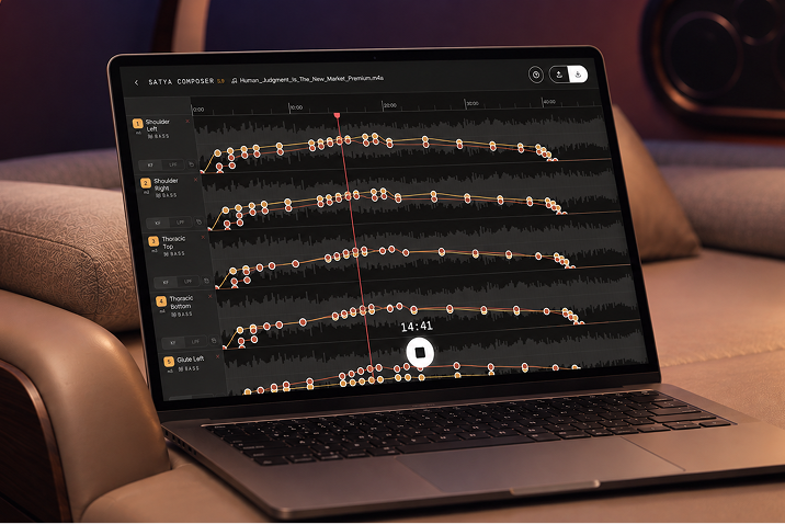 Close-up of Composer waveform tracks with colored keyframes and a play button.