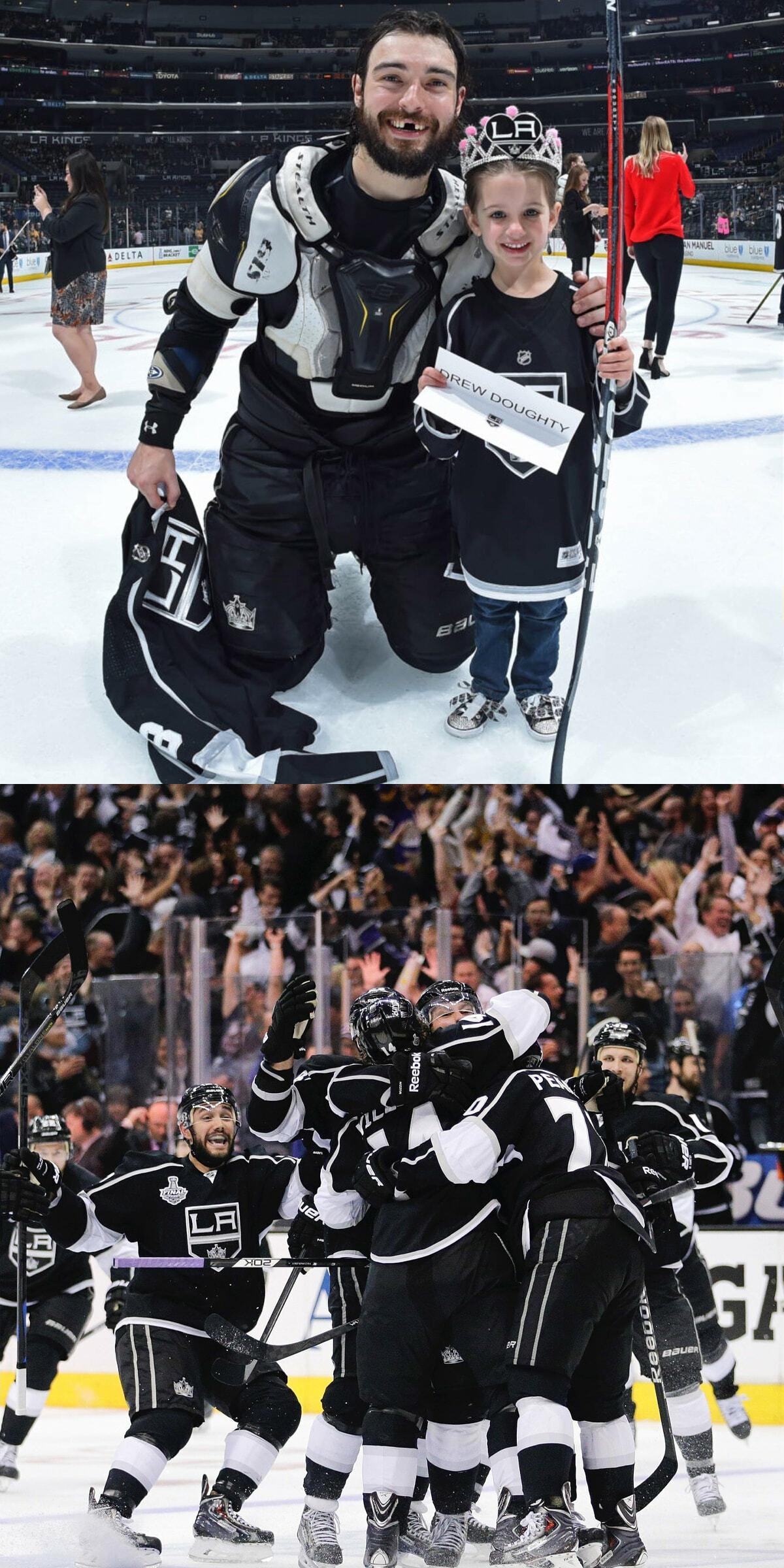 LA Kings goalie posing with a child above a team celebration on the ice