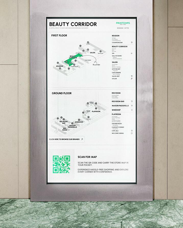 Wall-mounted Beauty Corridor directory with floor maps and QR code