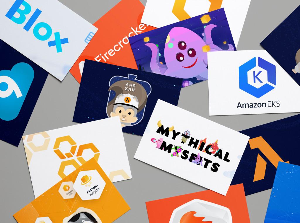 Scattered branded cards and stickers featuring AWS, Amazon EKS, and other designs