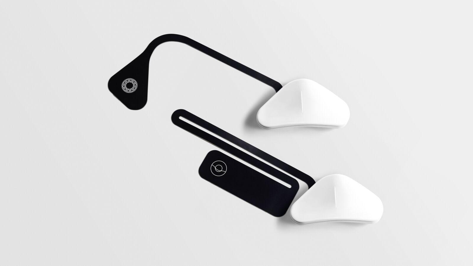 Minimal black and white concept rendering of wearable devices on a white surface