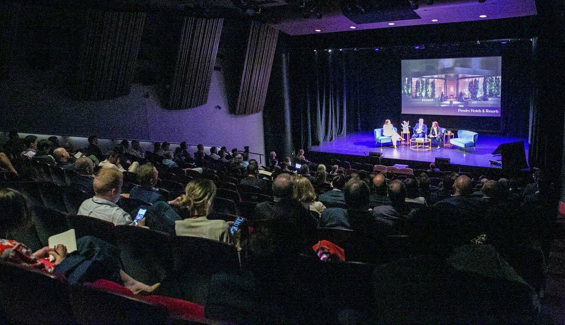 Full auditorium watching a Boutique Hotel Investment Conference panel on Pendry Hotels & Resorts