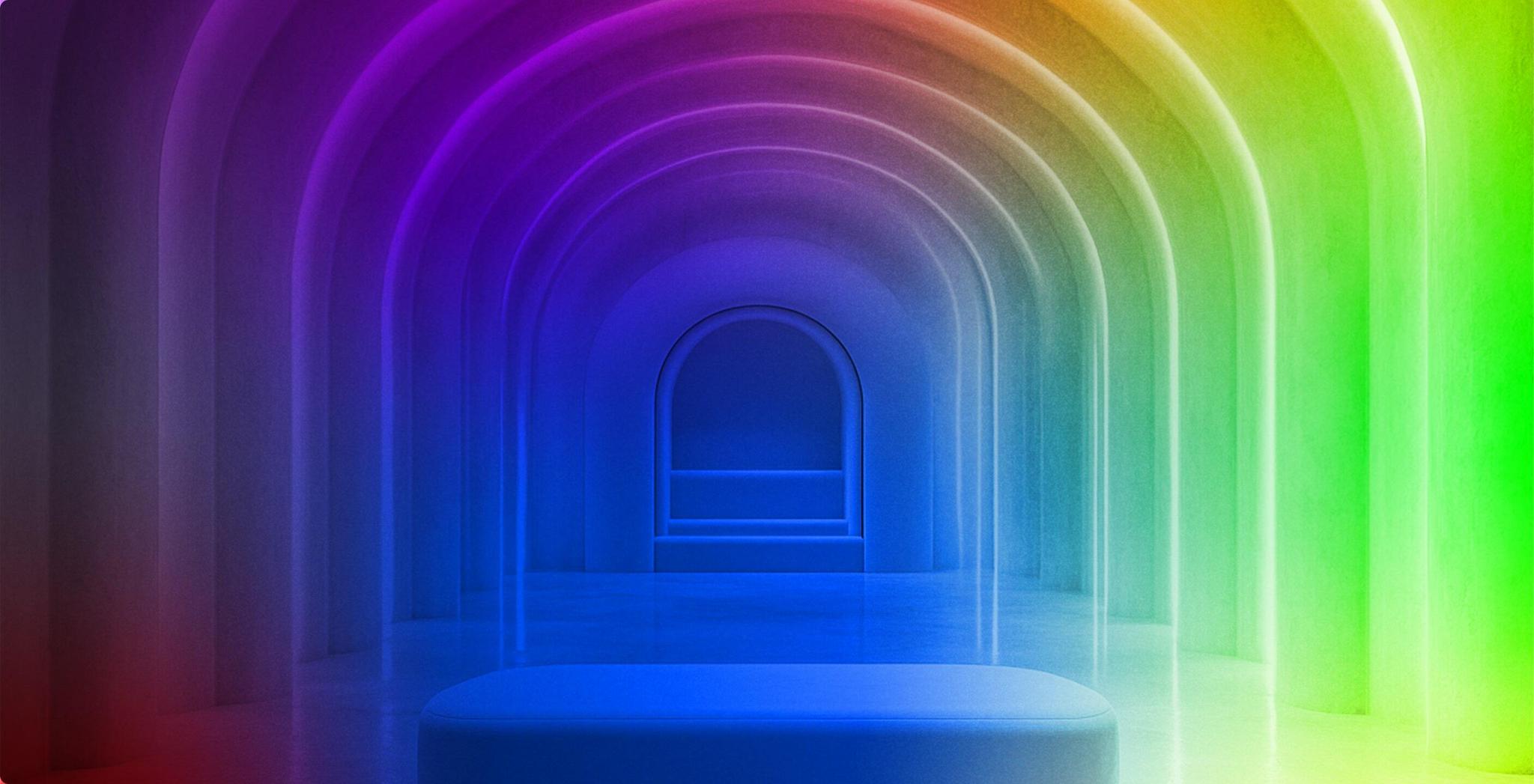 Rainbow-lit arched corridor with a central platform