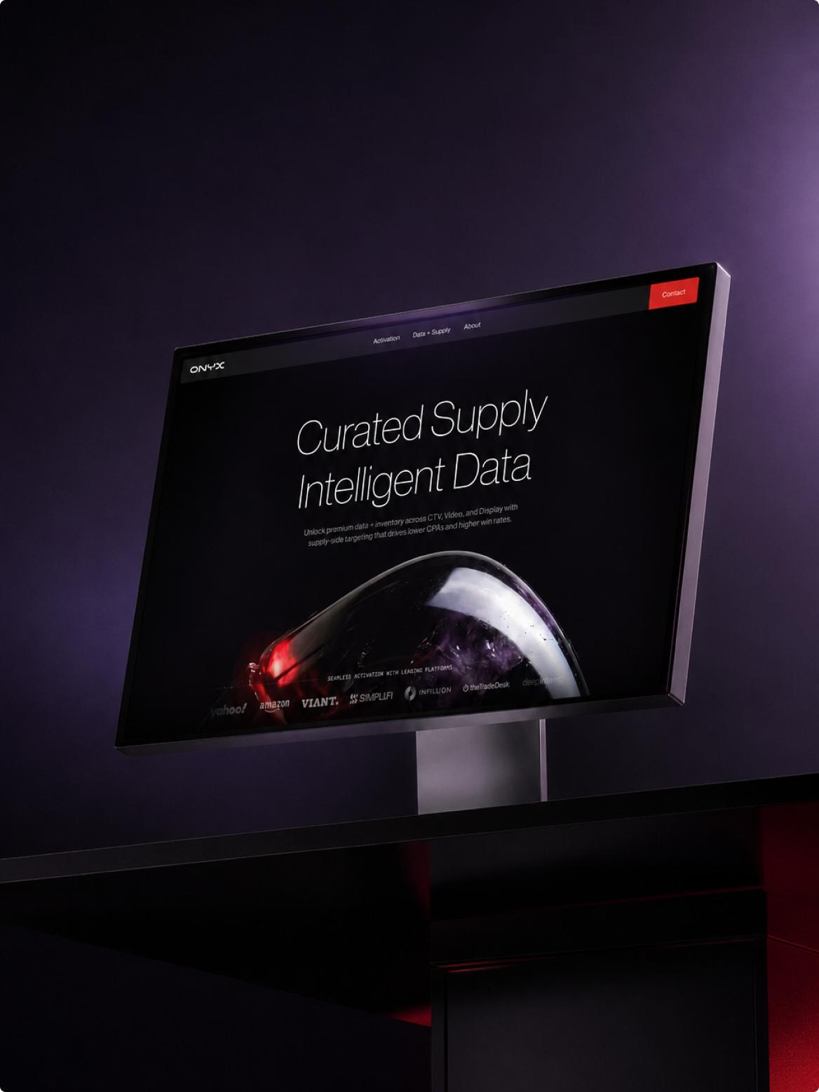 Monitor displaying a dark presentation slide about curated supply intelligence data