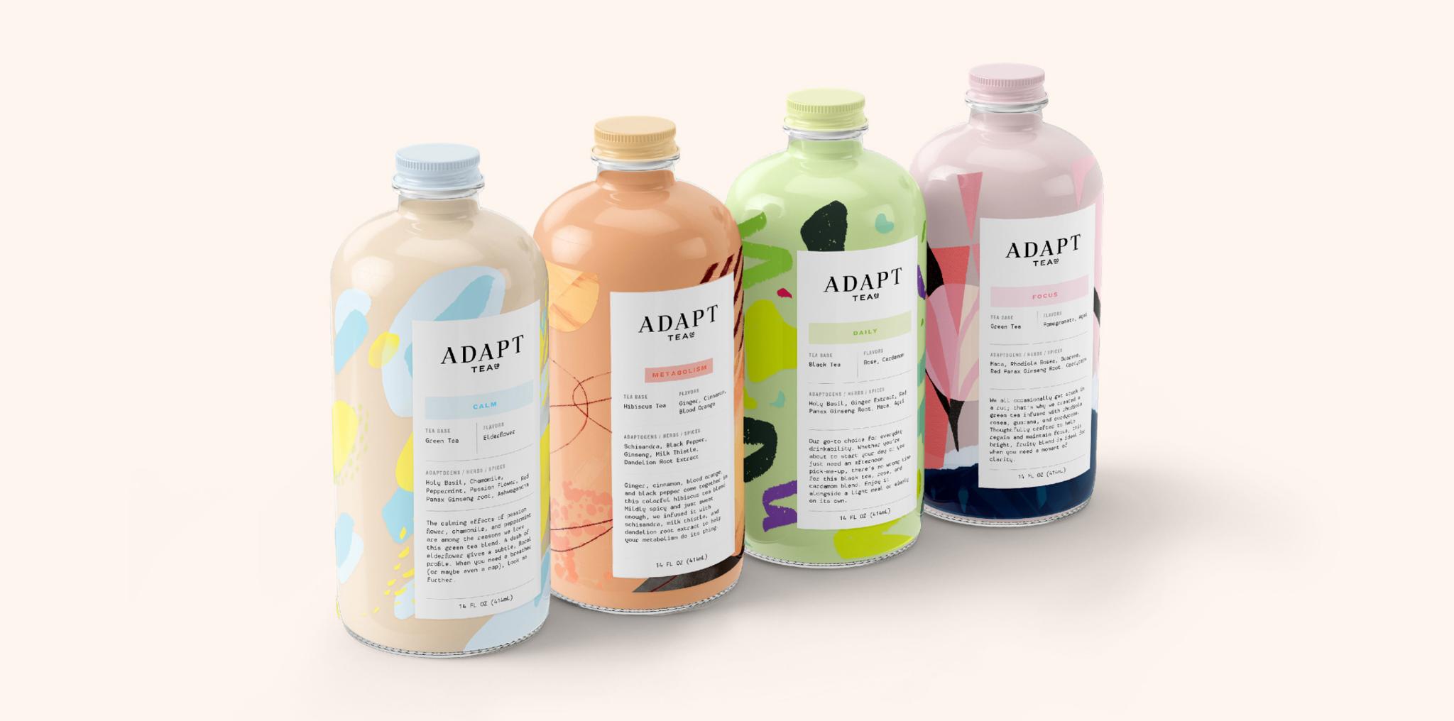 Four colorful Adapt Tea bottles lined up on a light background