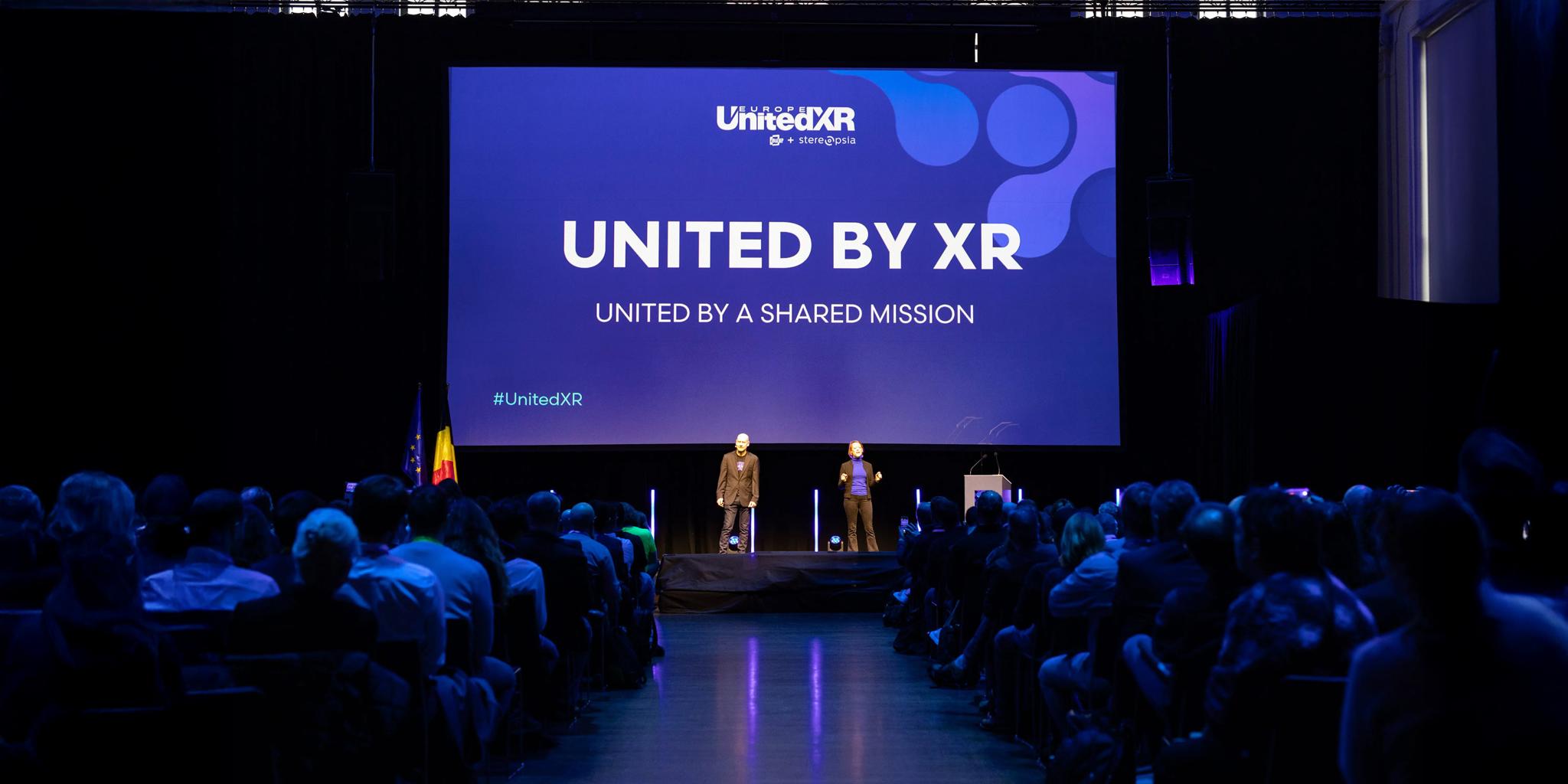 United by XR presentation on stage before an audience