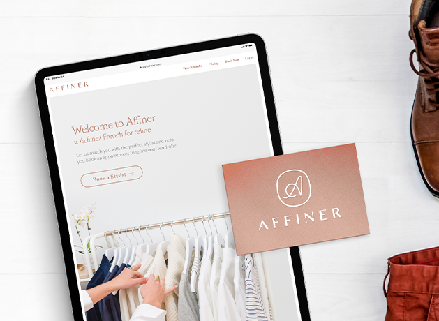 AFFINER website on a tablet with a branded business card and fashion items