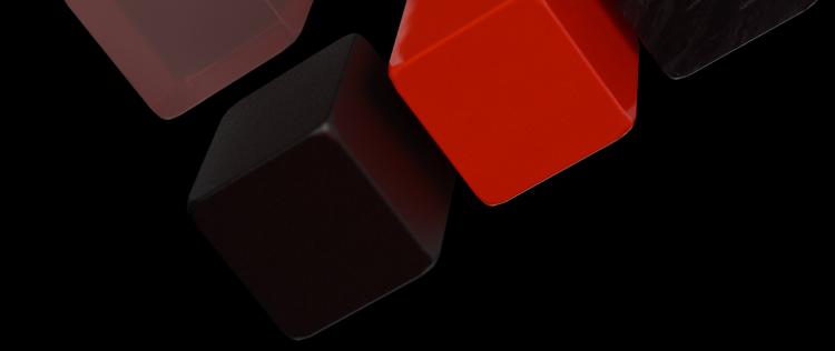 Abstract red and black cubes floating on a black background