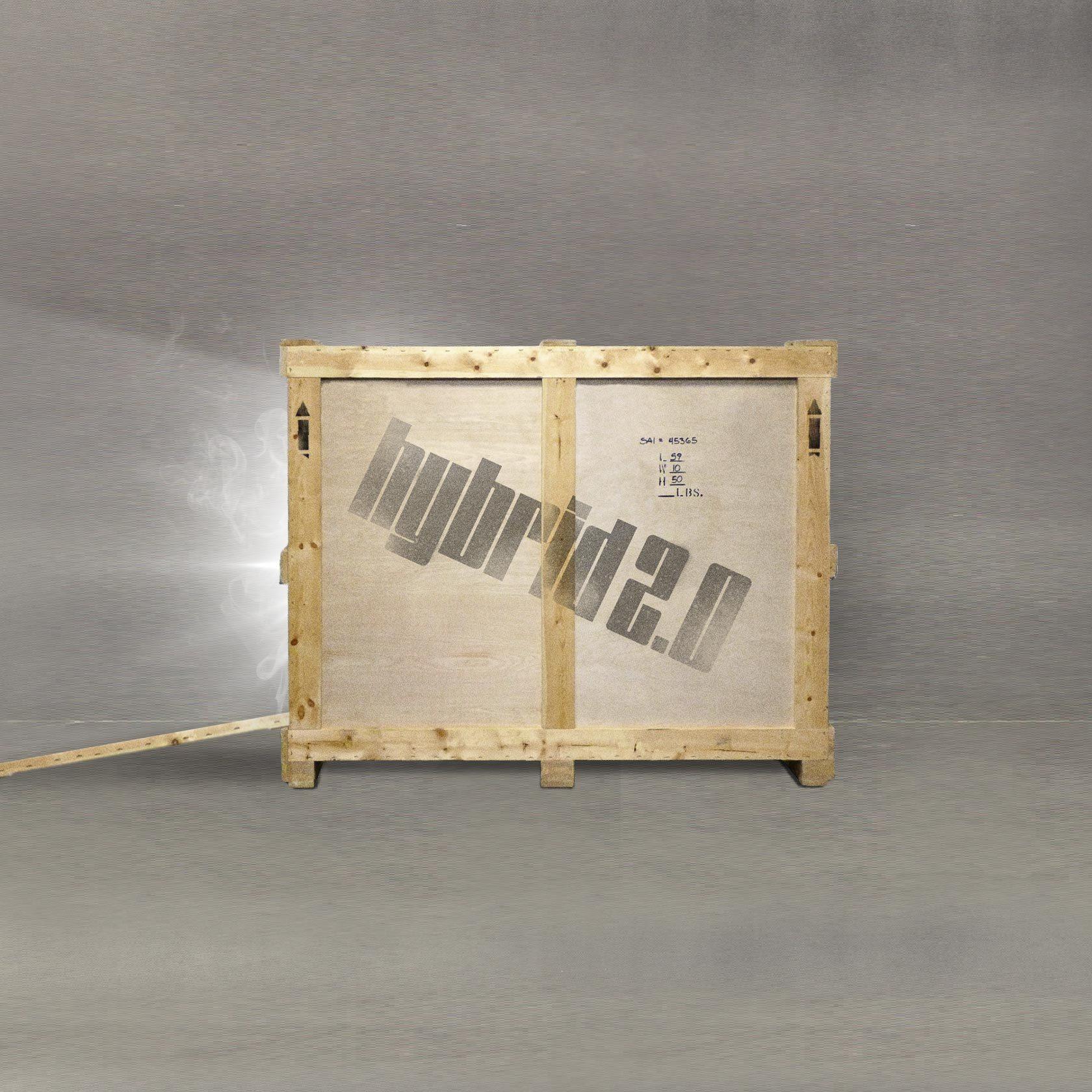 Wooden shipping crate stencilled hybrid 2.0 standing in a grey studio
