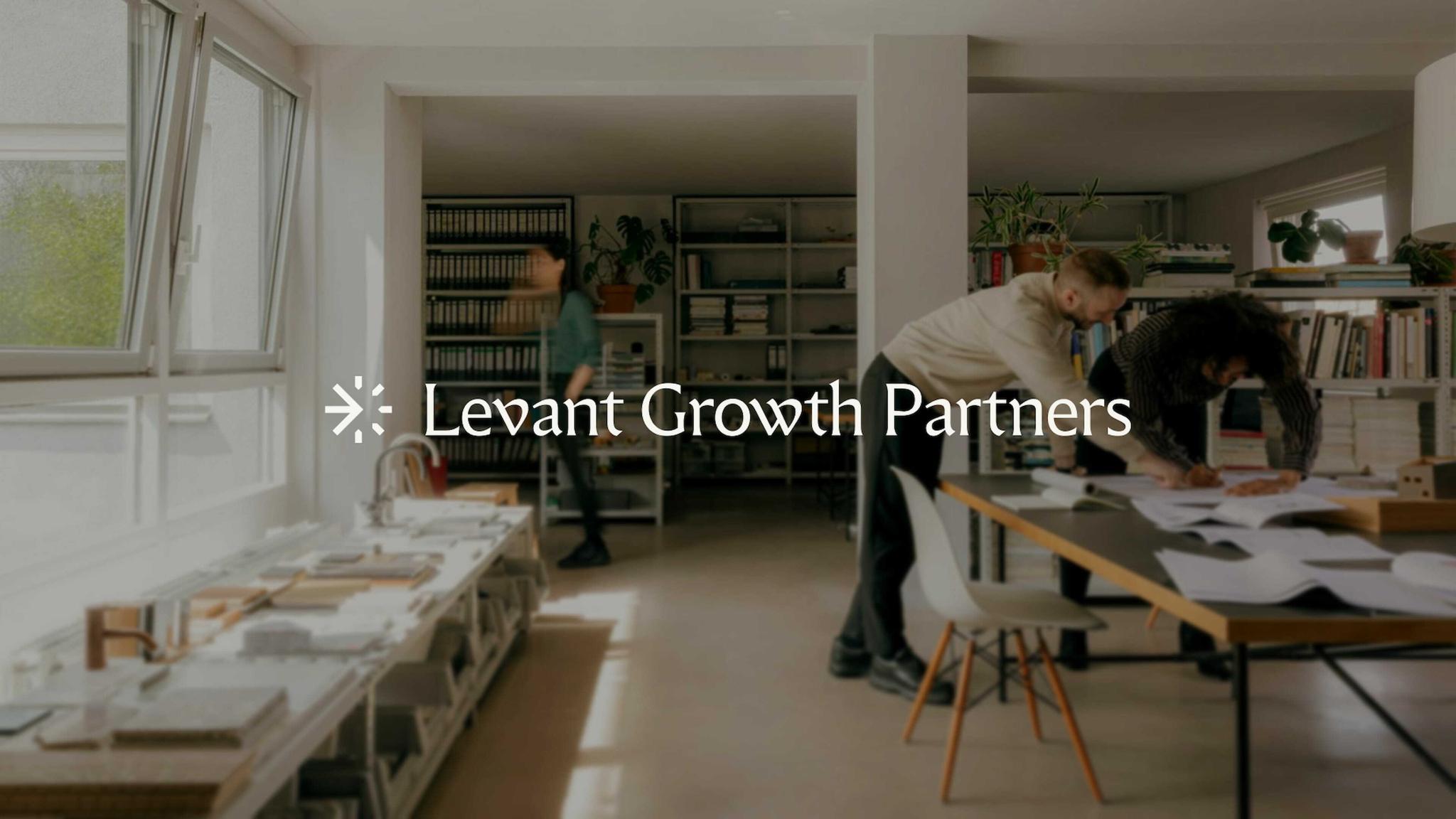 Workshop interior with Levant Growth Partners logo overlay