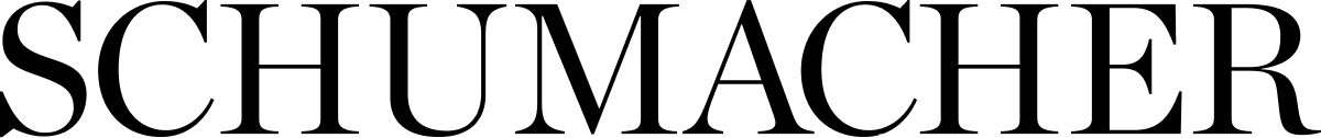Green "SCHUMACHER" wordmark