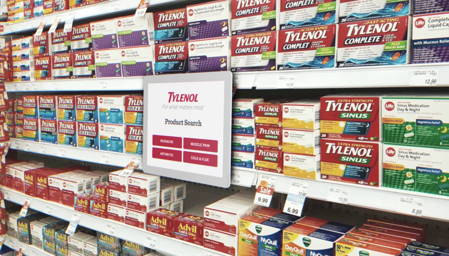 Tylenol and cold medicine shelves with a digital Tylenol Product Search display