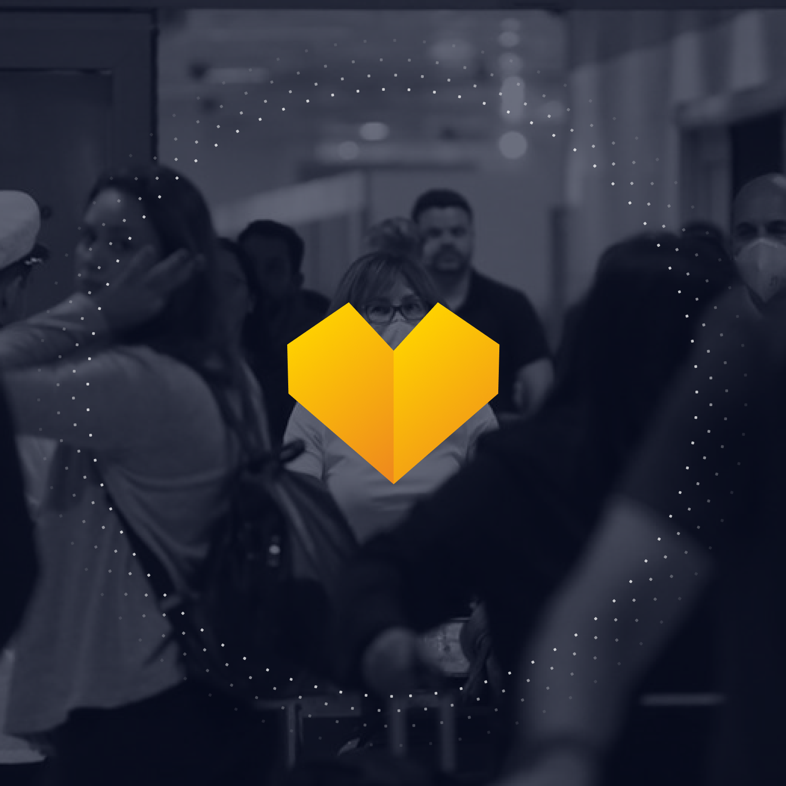 Blurred crowd scene with a yellow heart icon centered.