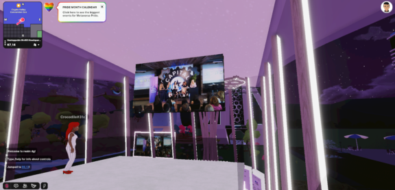 Virtual event space with avatars, neon columns, and a large presentation screen