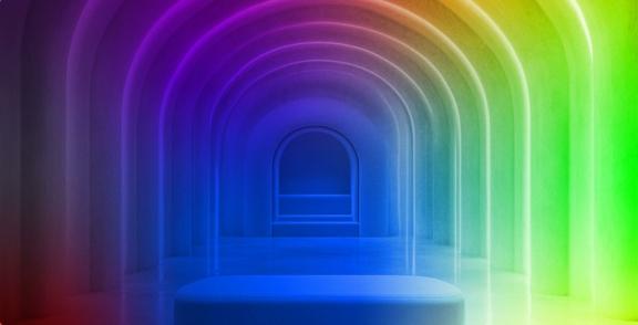 Rainbow-lit arched corridor with a central platform