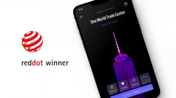 Red Dot winner mark beside a tilted smartphone showing a purple app interface