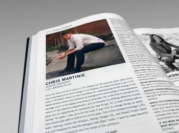 Open magazine spread with a designer profile and portrait