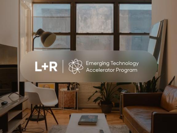 Modern office interior with L+R Emerging Technology Accelerator Program logo overlay