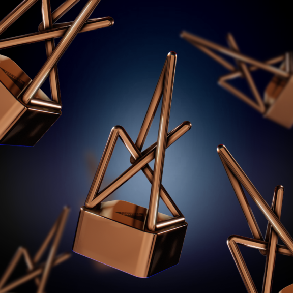 Bronze geometric trophy shapes floating on a dark blue background