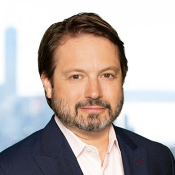 Mark Domino Portrait of a bearded man in a suit jacket