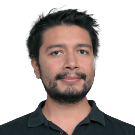 Pedro min Head-and-shoulders portrait of a bearded man in a dark polo on a green background