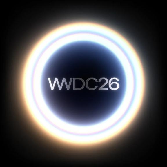 Apple park motion still first large 2x WWDC26 text centered inside a glowing ring on a black background