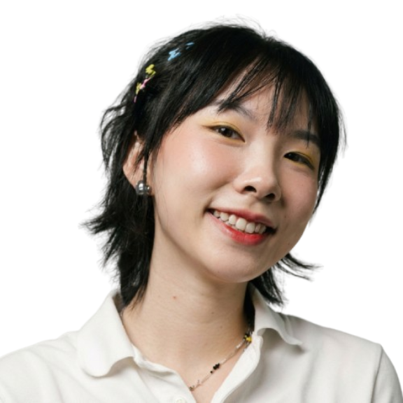 Bef1ea00 5da3 4e8e b66f 818104ffdf3b removebg preview Headshot of a smiling woman with hair clips wearing a white collared shirt