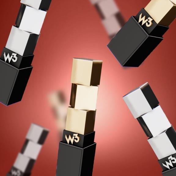 Floating W3-branded block shapes on a red background