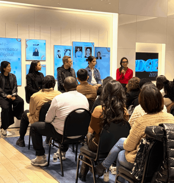 Panel discussion before an audience at a DGF event