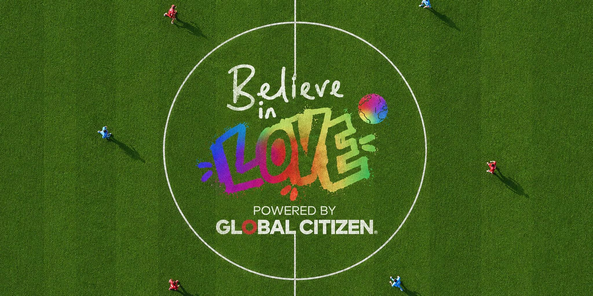 Believe in Love logo painted at midfield on a soccer pitch.