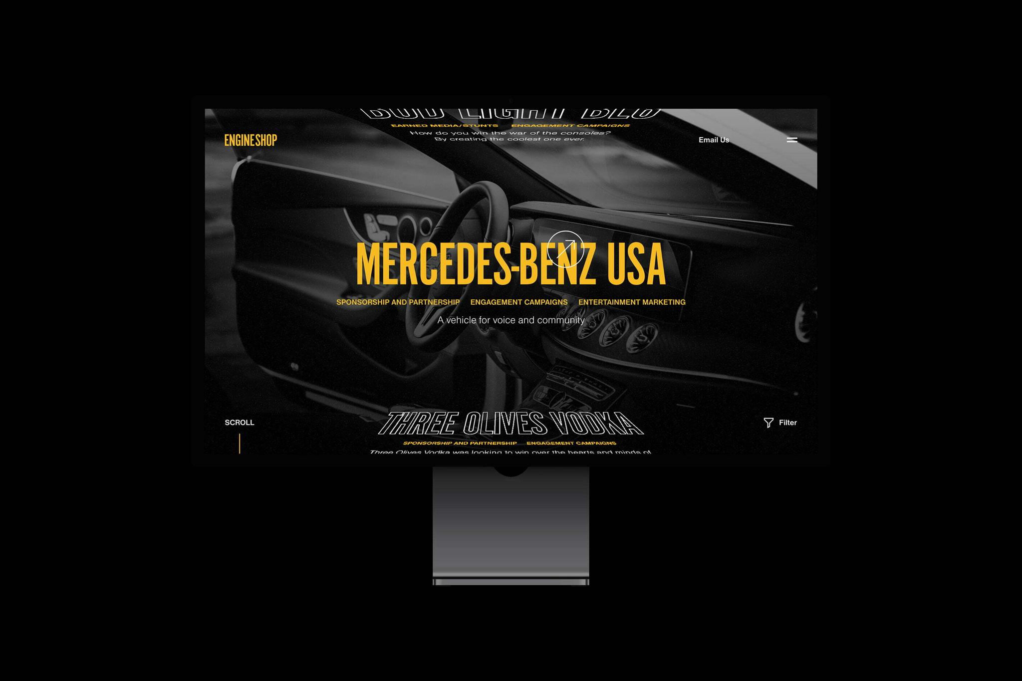 Small desktop website mockup on black background featuring Mercedes-Benz USA