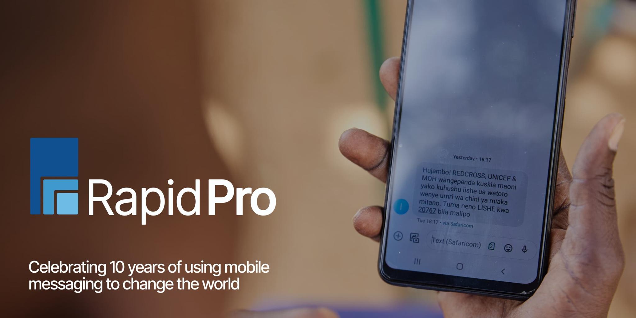 RapidPro anniversary banner with a phone showing text messages.