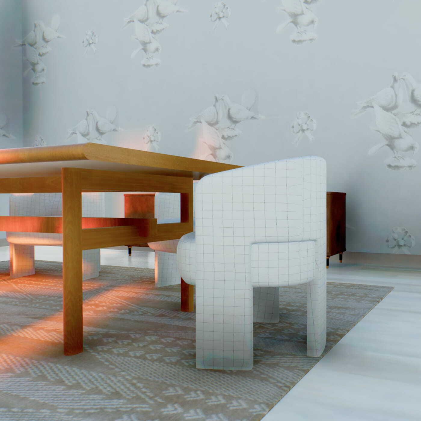 Modern dining room with white chairs, a wood table, patterned rug, and floral relief wall