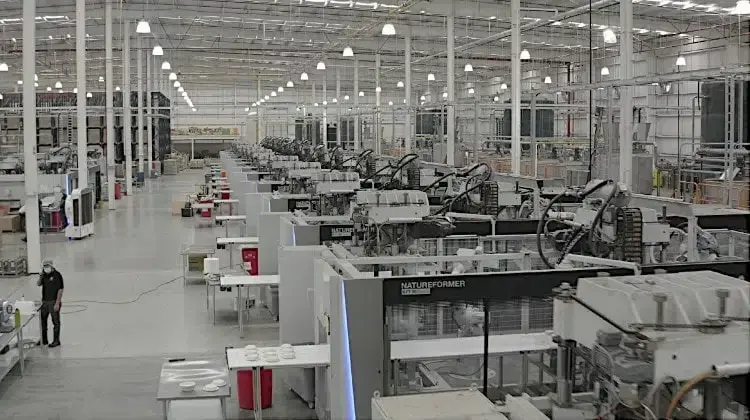Large industrial factory floor filled with machinery