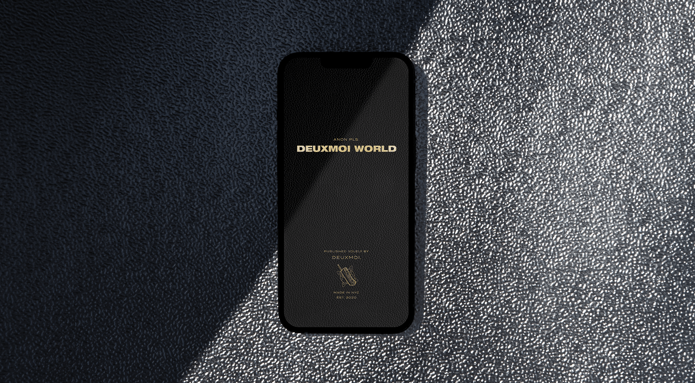Phone with Deuxmoi World splash screen on textured black surface