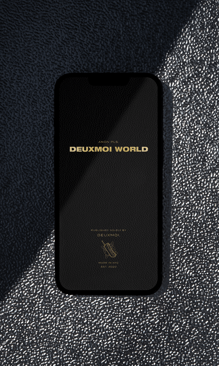 Close-up of phone showing Deuxmoi World splash screen